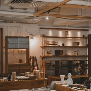 brown wooden table near brown wooden shelf